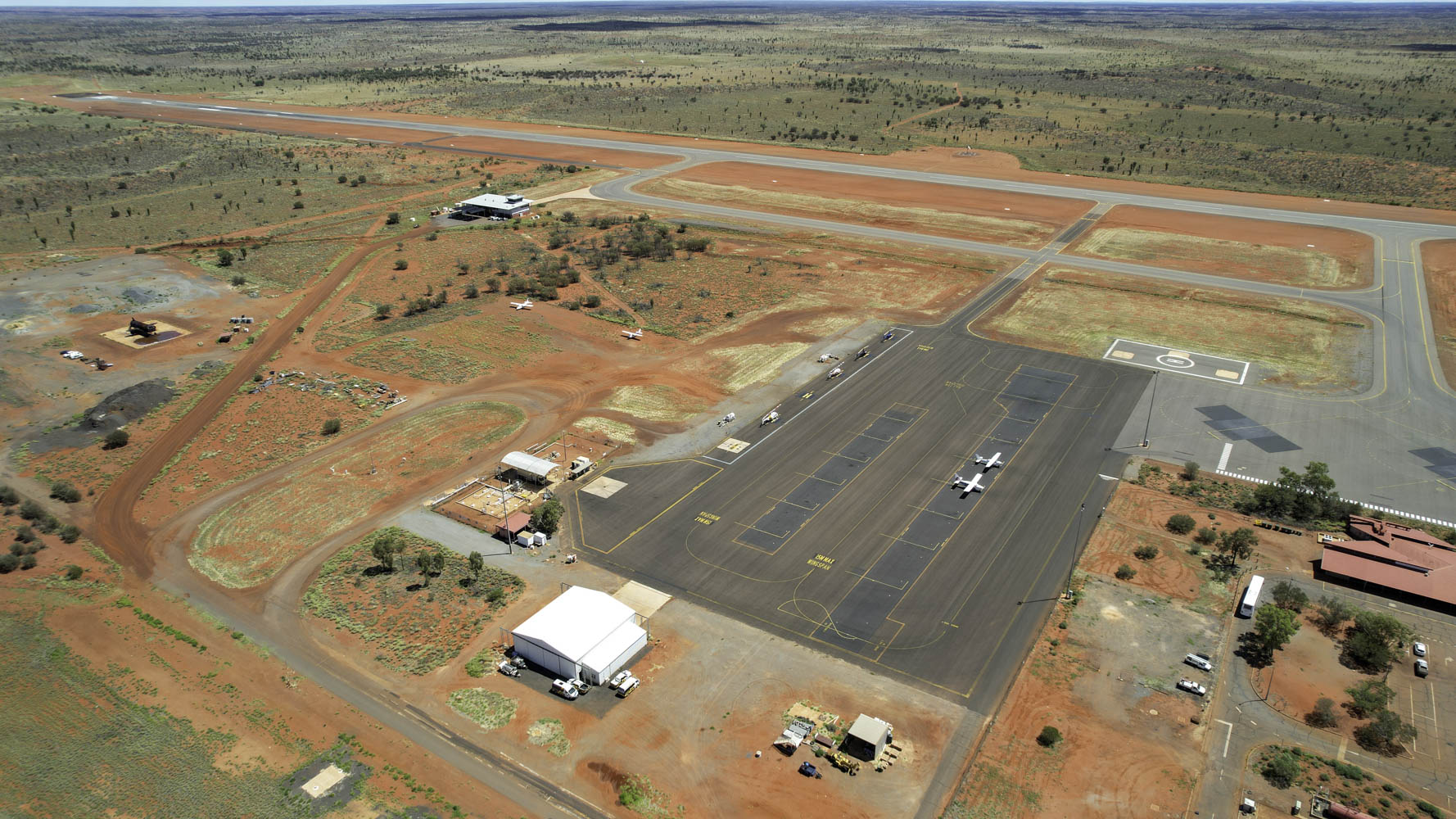 Voyages Indigenous Tourism Ayers Rock Resort Connelan Airport And Accommodation Aerial View Of Resurfacing