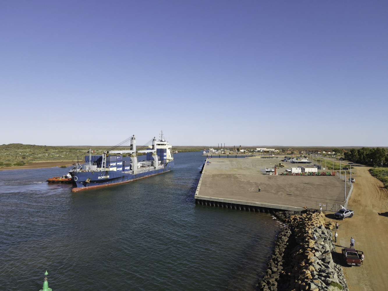 Onslow Marine Support Base Western Australia View Of Blue Boat Docking Base On River Blue Sky
