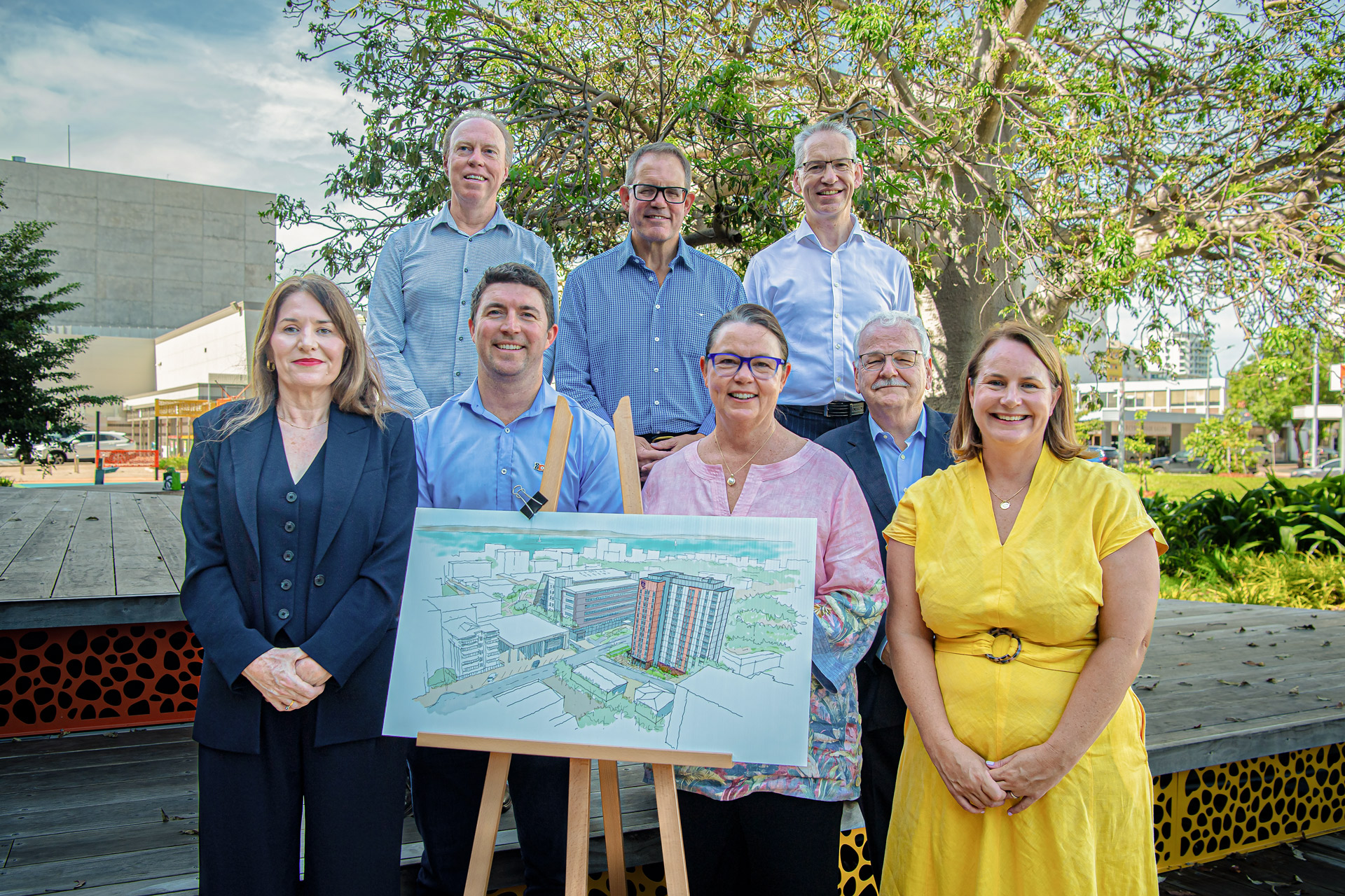Minister King, Nita Green, Neil MacDonald and dignitaries and stakeholders with artist render on an easel.