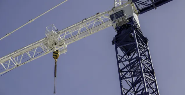 View From Below Of A Blue And White Construction Crane At JCU Engineering And Innovation Place Site