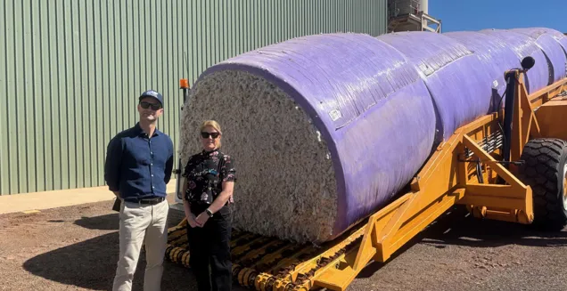 Louie Trajkoski and Tracey Hayes at the Kimberley Cotton Gin standing in front of the first delivery of cotton